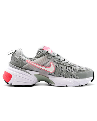 Grey nike trainers with pink tick top